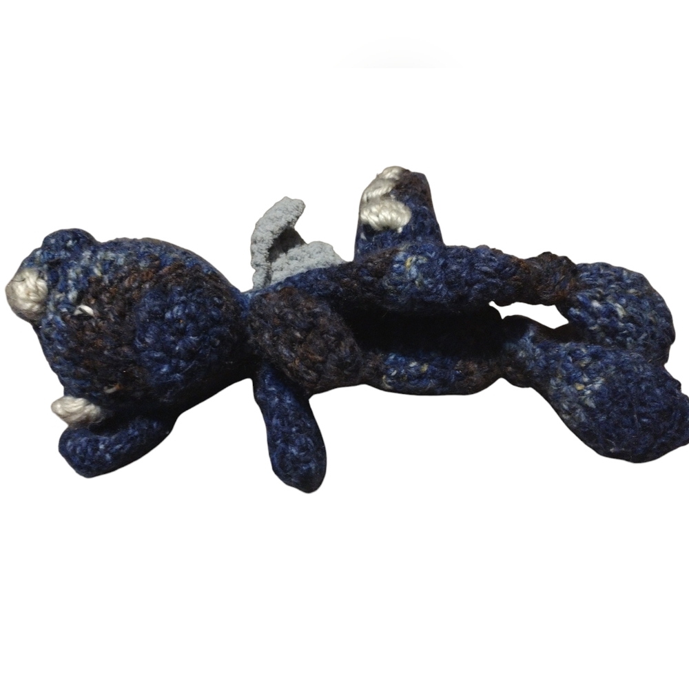 Dragon snuggley, low fiber fill stuffed animal. Small blue and grey
